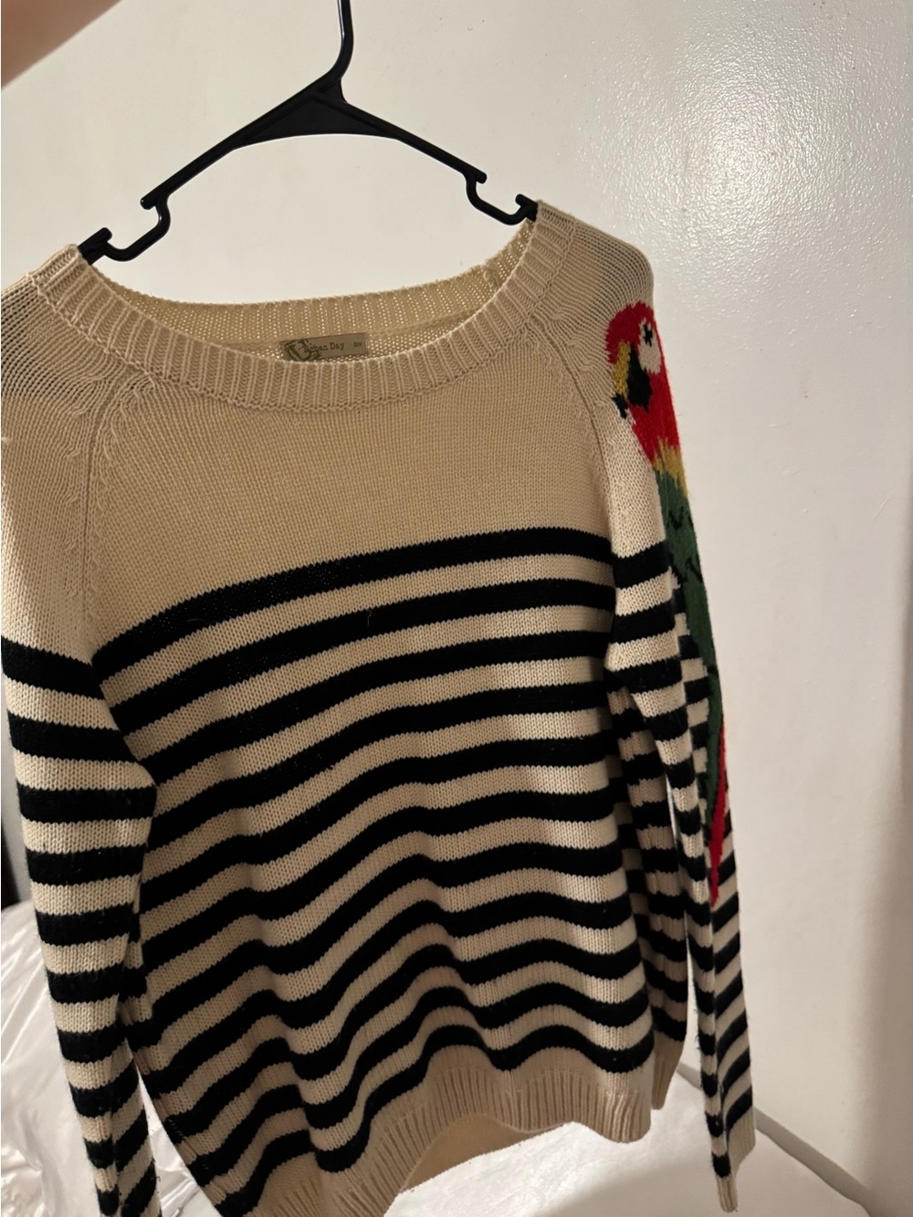 Striped Cream and Black Sweater with Parrot Accent